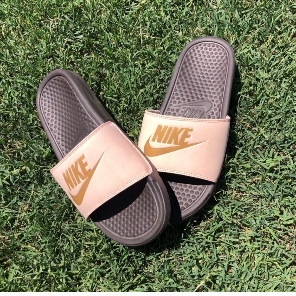 Pink Nike slides